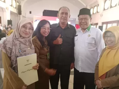 Bersama Kepala Dinas Pendidikan Kota Surabaya